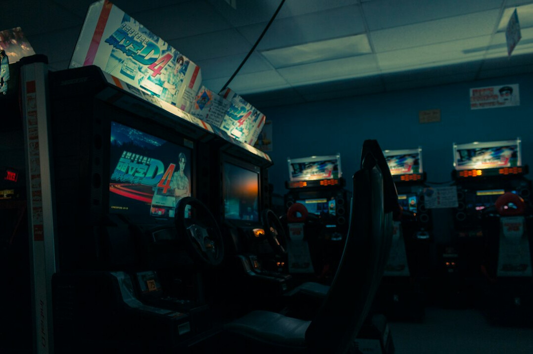 A room with many screens and monitors